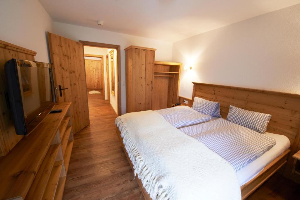 Postel nebo postele na pokoji v ubytování Hotel Bristol