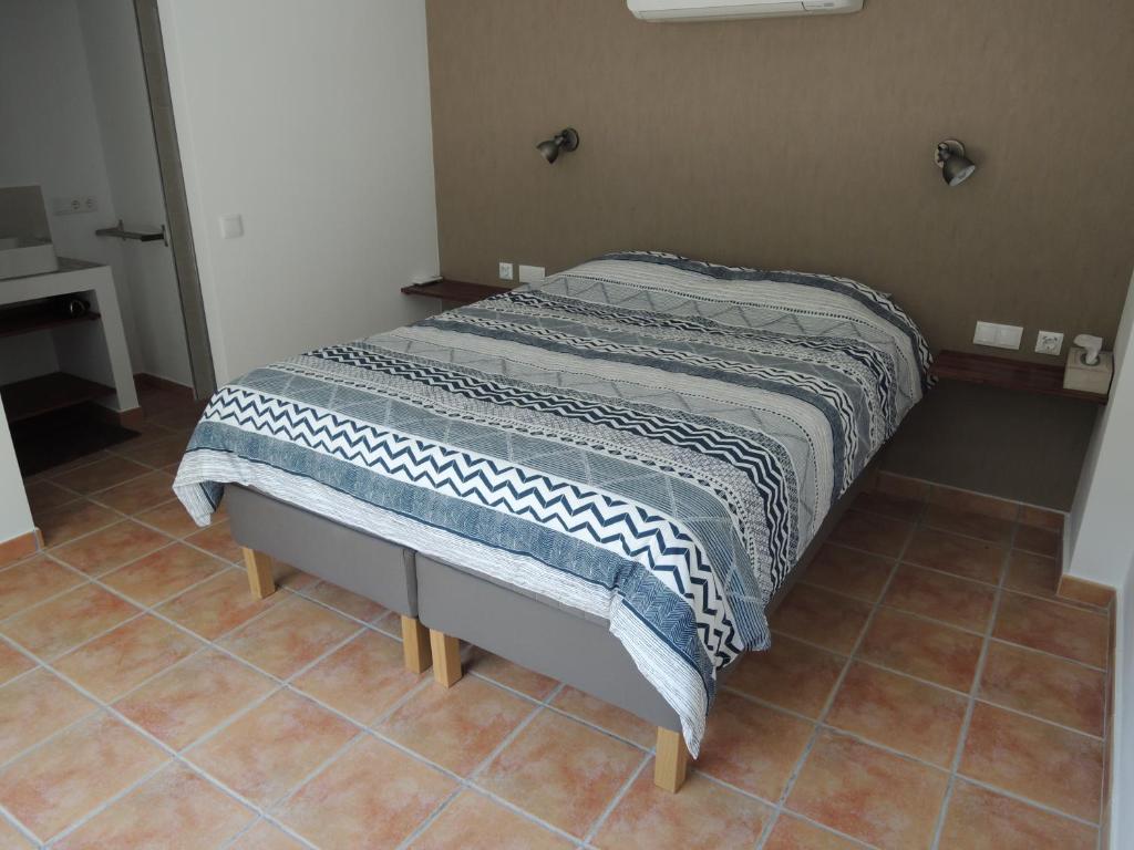 Postel nebo postele na pokoji v ubytování Finca Mirador