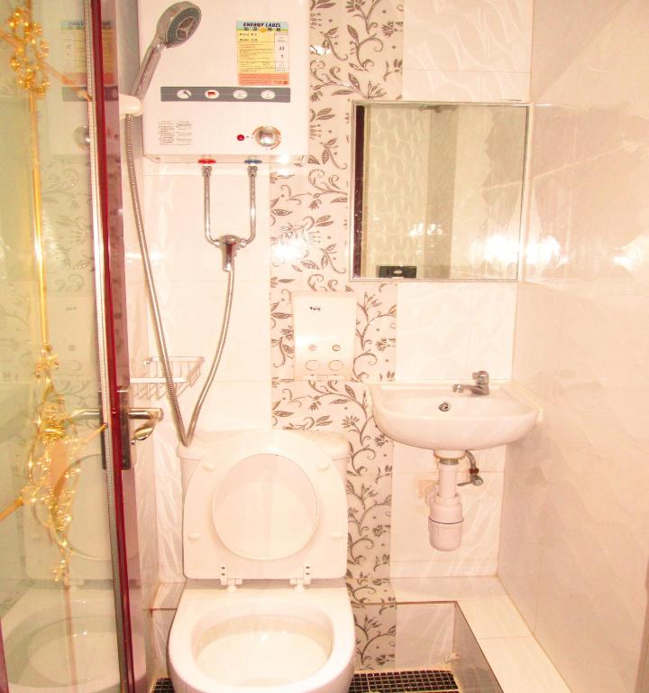 Koupelna v ubytování Pay-Less Guesthouse (7/F A9)