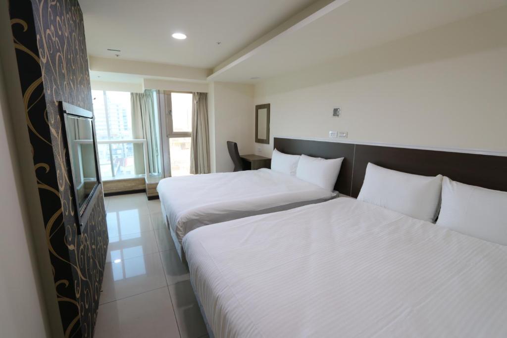 Yi Dian Yuan Hotel - Quadruple Chambre