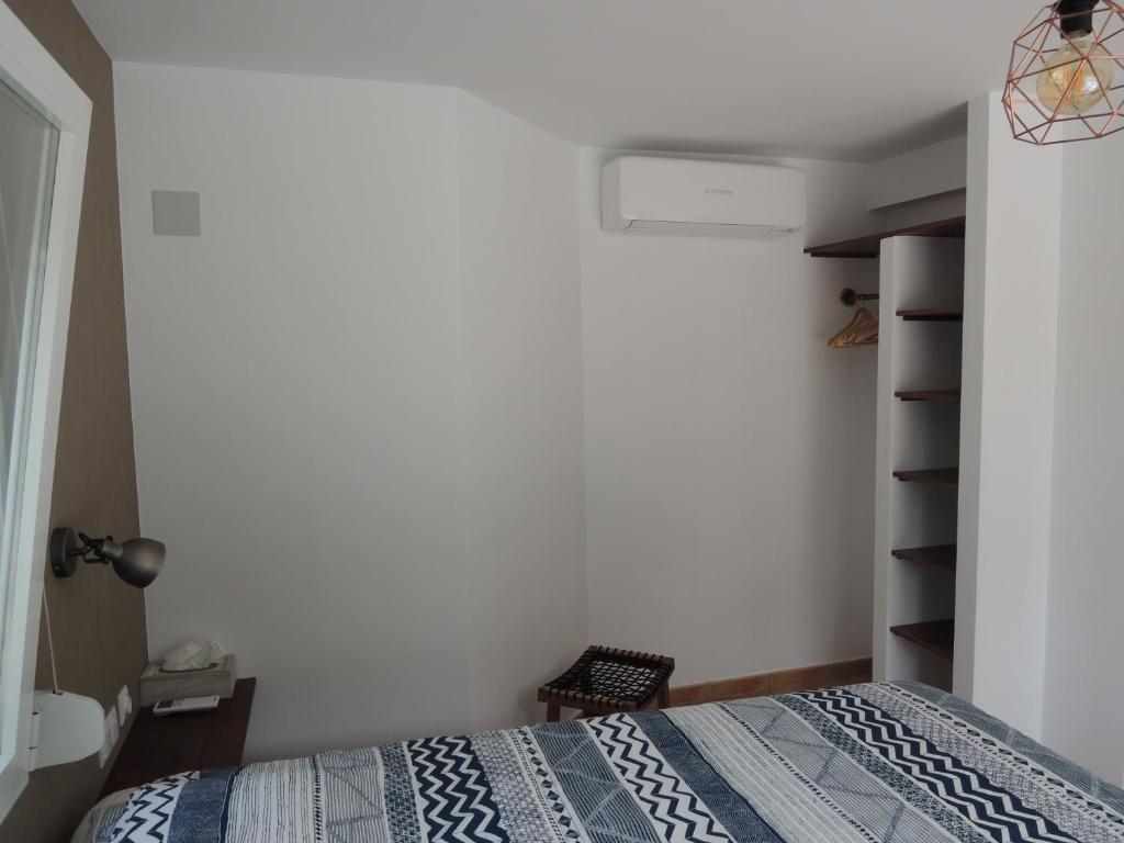 Postel nebo postele na pokoji v ubytování Finca Mirador
