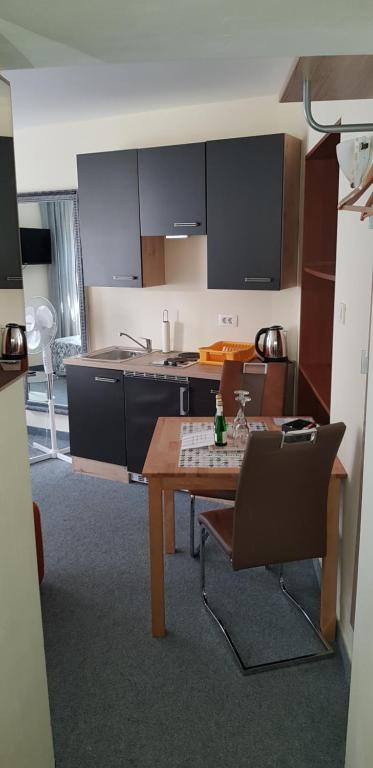 Kuchyň nebo kuchyňský kout v ubytování ELG Rooms