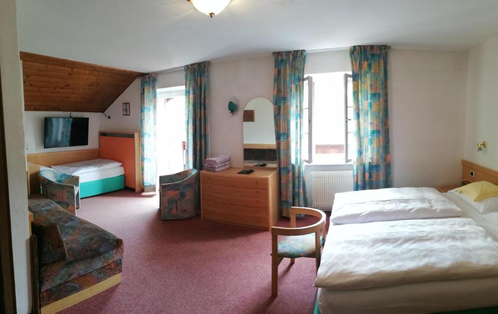 Postel nebo postele na pokoji v ubytování Hotel Rodes