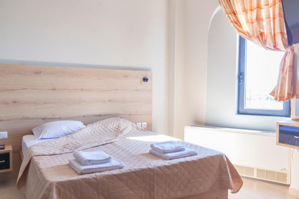 Postel nebo postele na pokoji v ubytování Via Mare Apartments