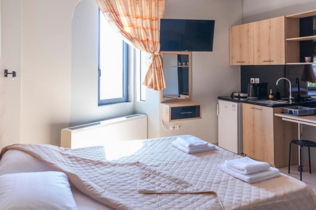 Kuchyň nebo kuchyňský kout v ubytování Via Mare Apartments