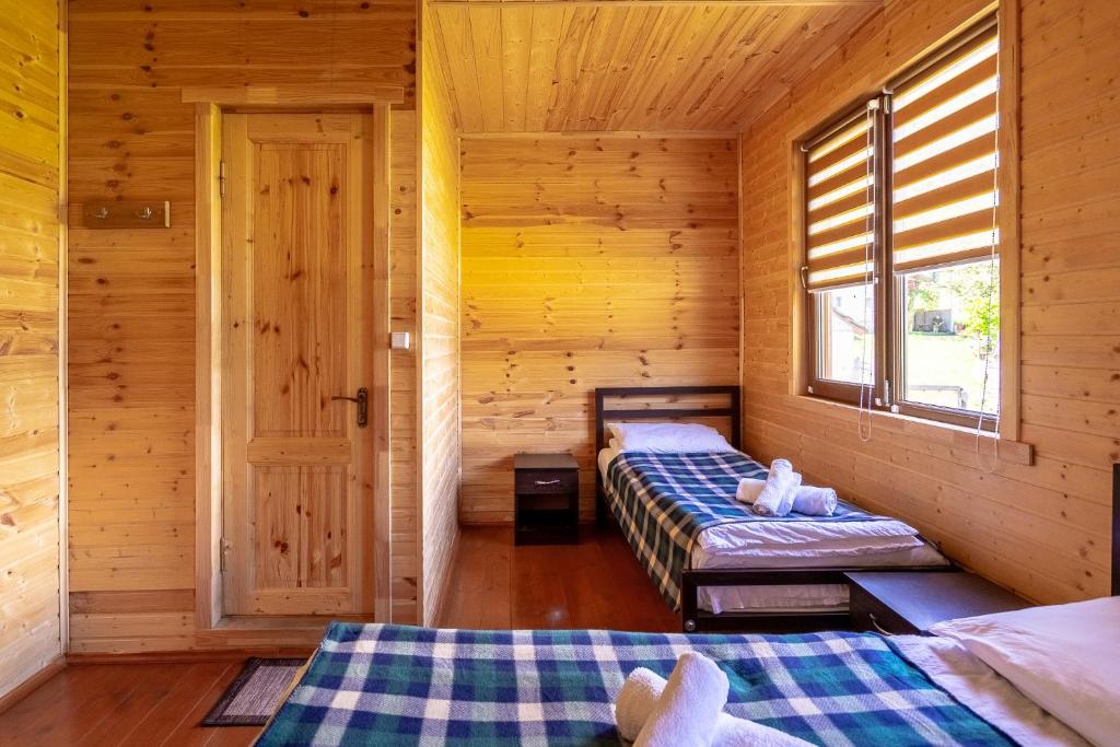 Postel nebo postele na pokoji v ubytování Badishi Guesthouse