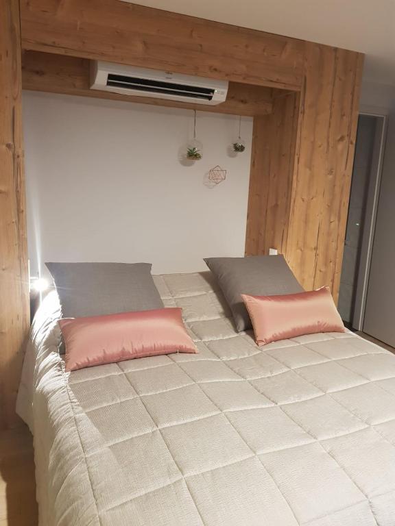 Postel nebo postele na pokoji v ubytování Caveau de l'ami Fritz
