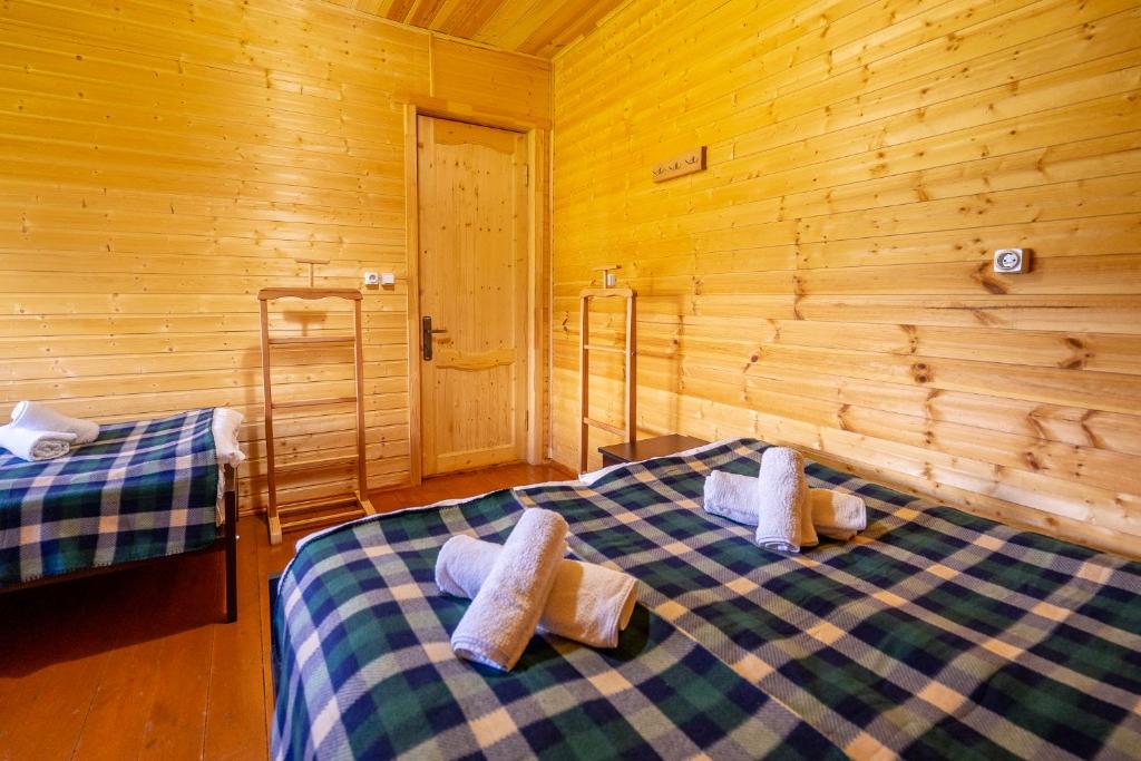 Postel nebo postele na pokoji v ubytování Badishi Guesthouse