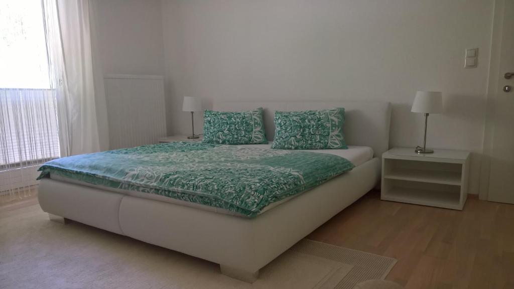 Postel nebo postele na pokoji v ubytování Appartement Erlbacher