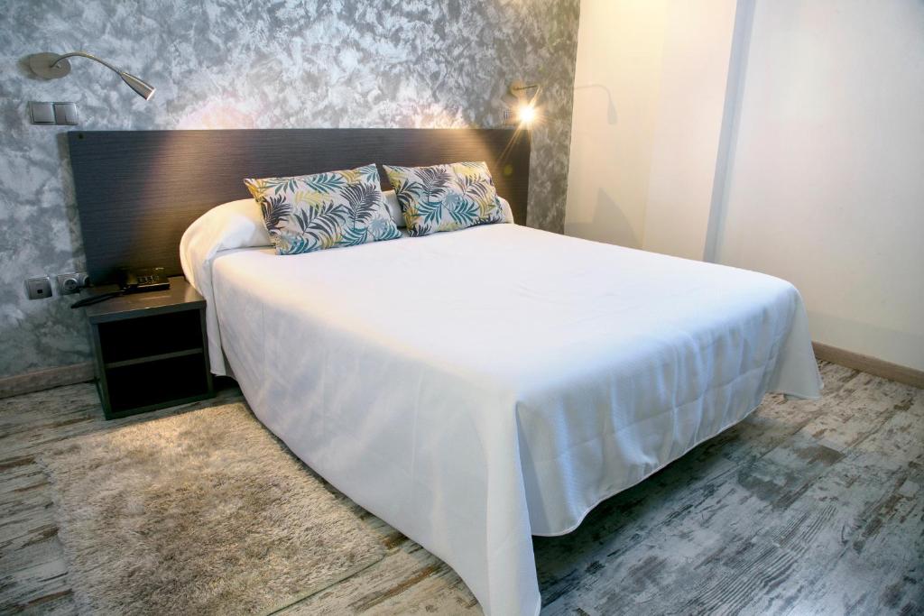 Giường trong phòng chung tại Habitaciones Premium Finca la Casona