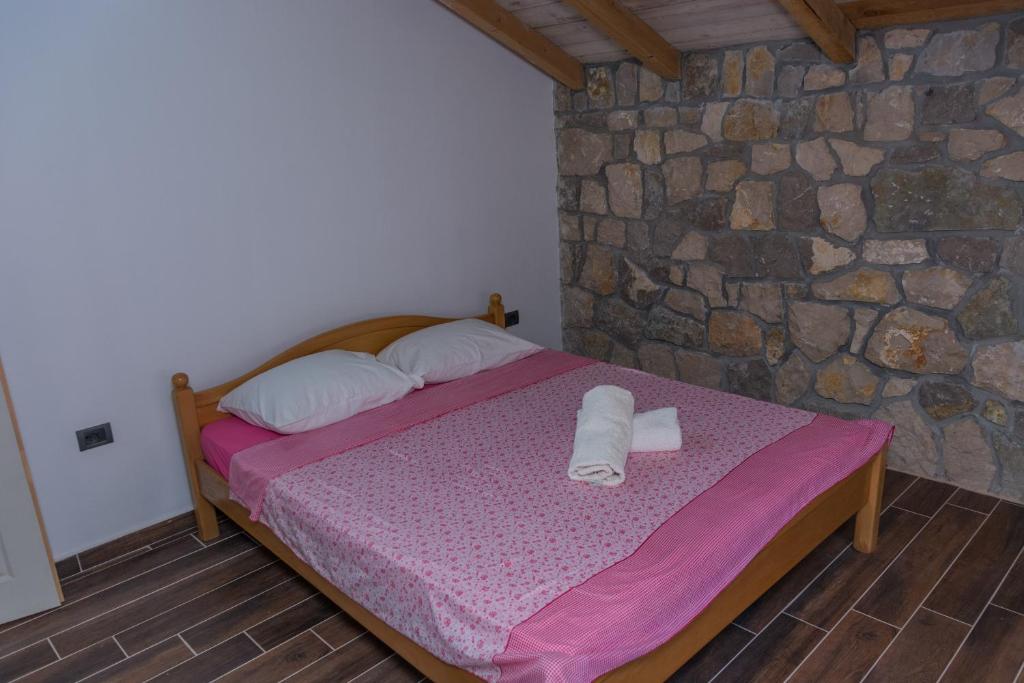 Postel nebo postele na pokoji v ubytování Leonida Resort