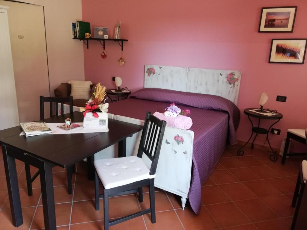 Postel nebo postele na pokoji v ubytování B&B LA Garzetta