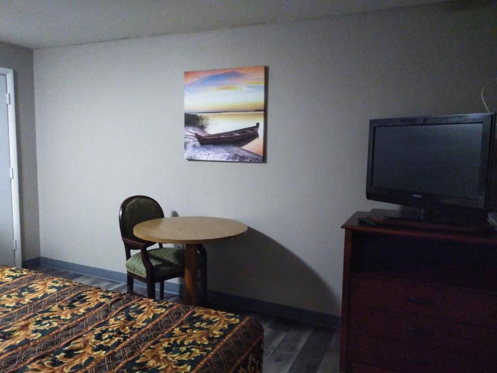 TV a/nebo společenská místnost v ubytování Tourist Inn
