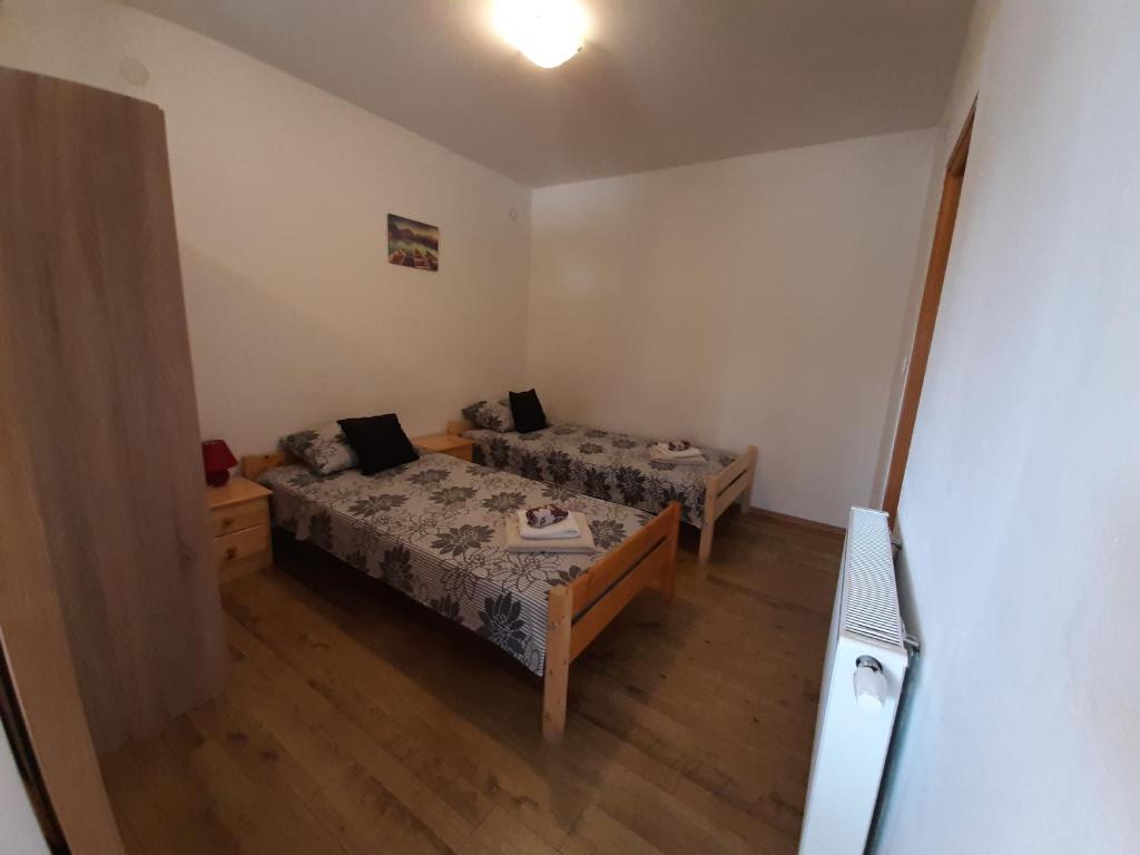 Posteľ alebo postele v izbe v ubytovaní Rooms LU&LA