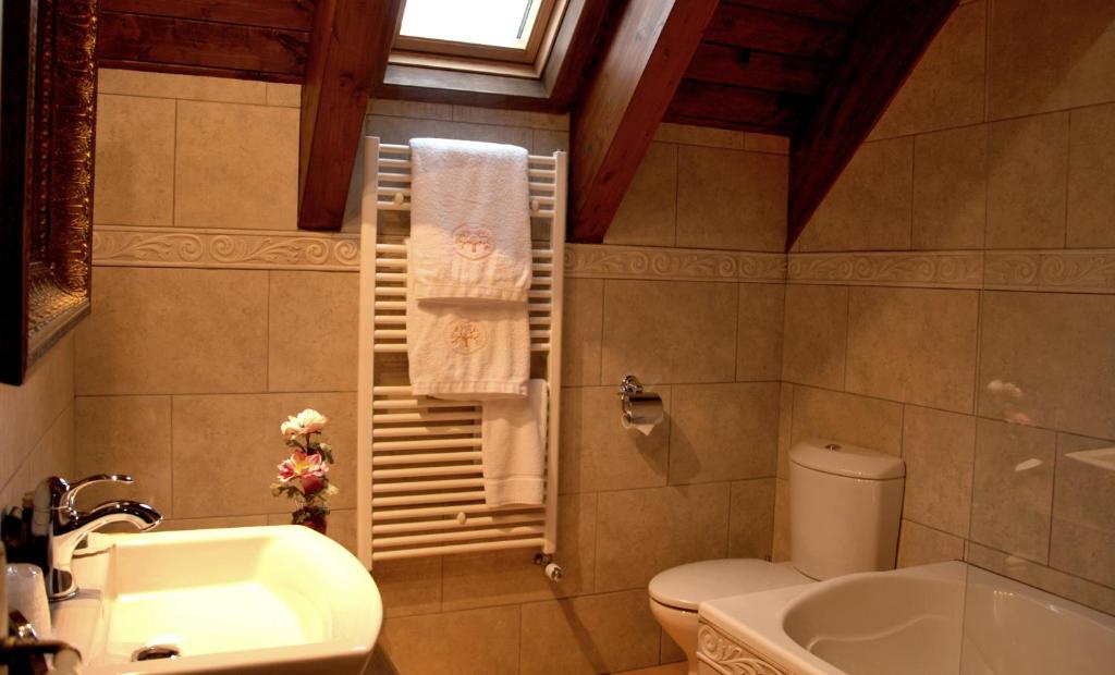 Koupelna v ubytování Hotel Selba d'Ansils