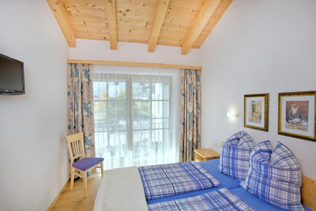 Postel nebo postele na pokoji v ubytování Haus Seifriedsberger