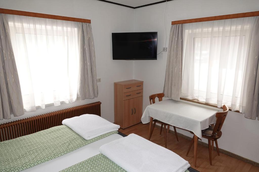 Postel nebo postele na pokoji v ubytování Ferienwohnung Grießer