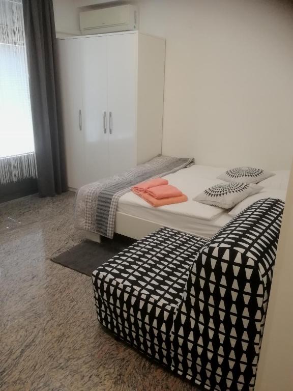 Postel nebo postele na pokoji v ubytování Apartma ROK