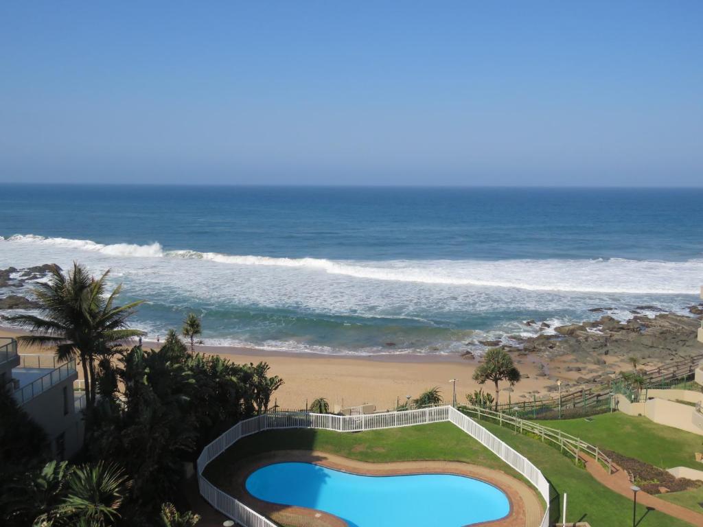 a view of the ocean from the balcony of a condo at 406 Les Mouettes in Ballito