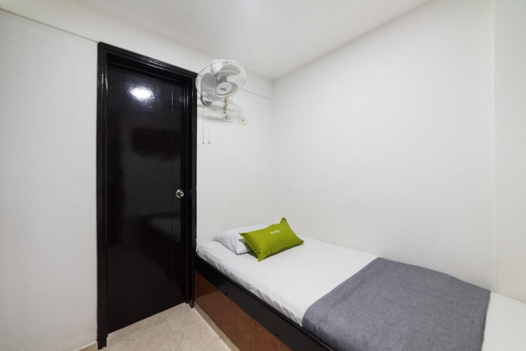 Postel nebo postele na pokoji v ubytování Ayenda 1122 Victoria