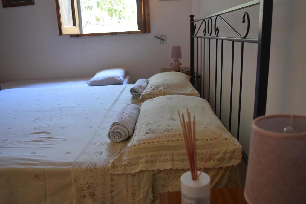 A bed or beds in a room at La casa di mare Salento