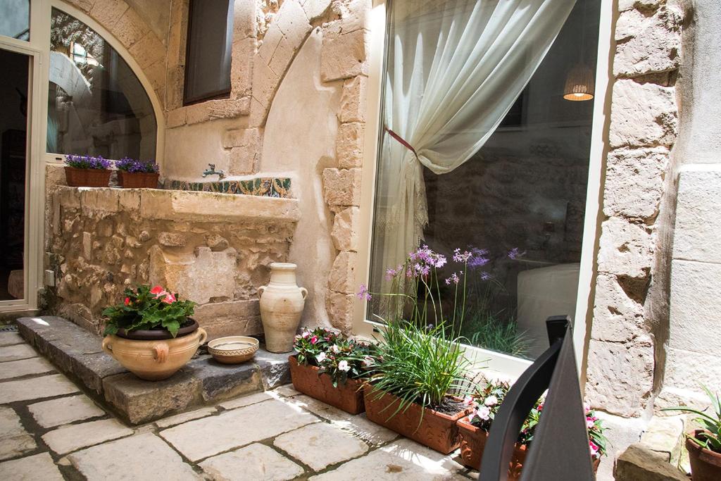 Vonkajšia záhrada v ubytovaní Ortigia Ancient House
