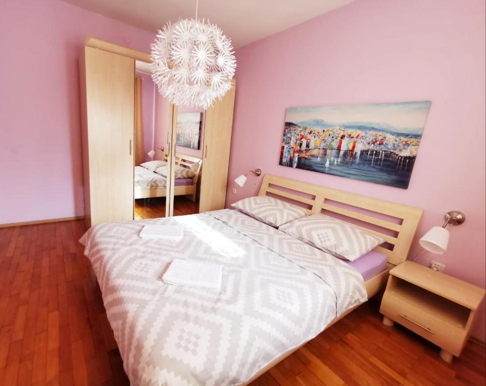 Posteľ alebo postele v izbe v ubytovaní Apartment Arena Zagreb