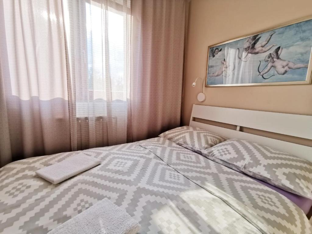 Posteľ alebo postele v izbe v ubytovaní Apartment Arena Zagreb