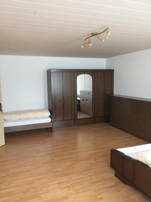 Ein Bett oder Betten in einem Zimmer der Unterkunft Hotel Alpina