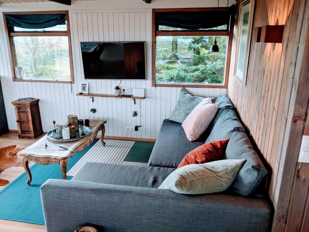 Posezení v ubytování Mulakot Cosy Cabins