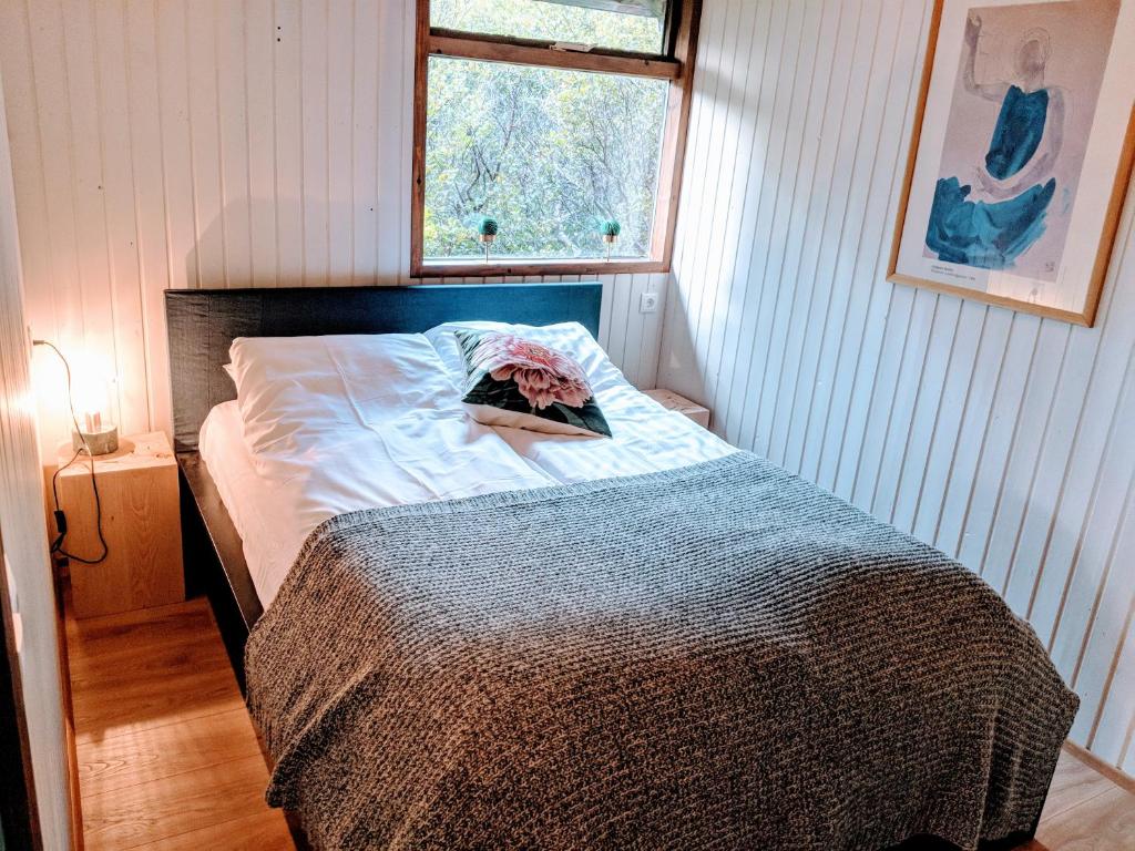 Postel nebo postele na pokoji v ubytování Mulakot Cosy Cabins