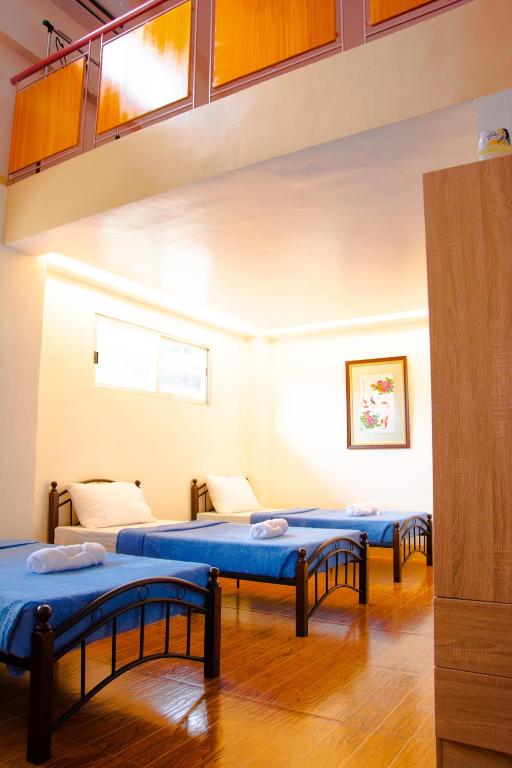 Postel nebo postele na pokoji v ubytování Havendwell Garden Resort
