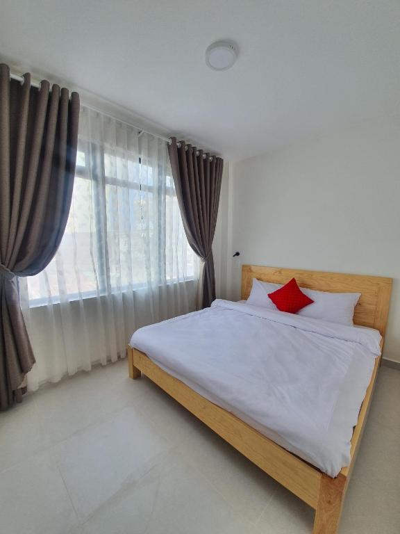 Postel nebo postele na pokoji v ubytování Hello Dalat Hostel