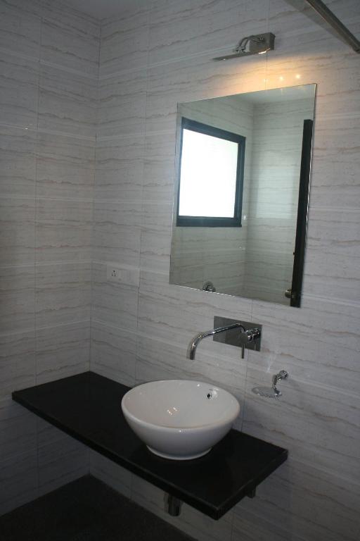 Koupelna v ubytování Hotel Girnar