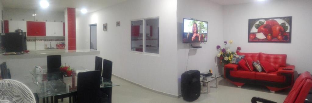 TV a/nebo společenská místnost v ubytování La Roca Coveñas Apartamentos