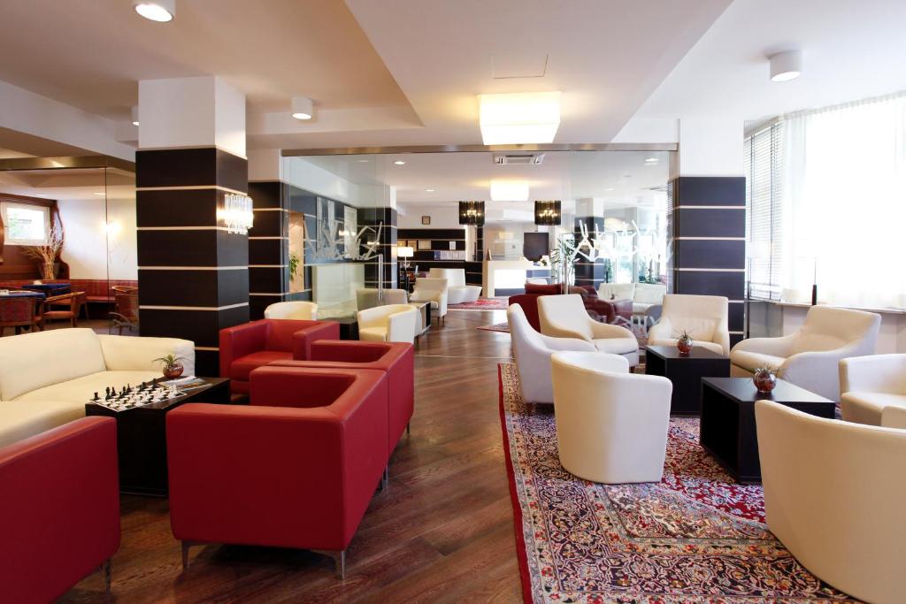 Część wypoczynkowa w obiekcie Palace Hotel Città