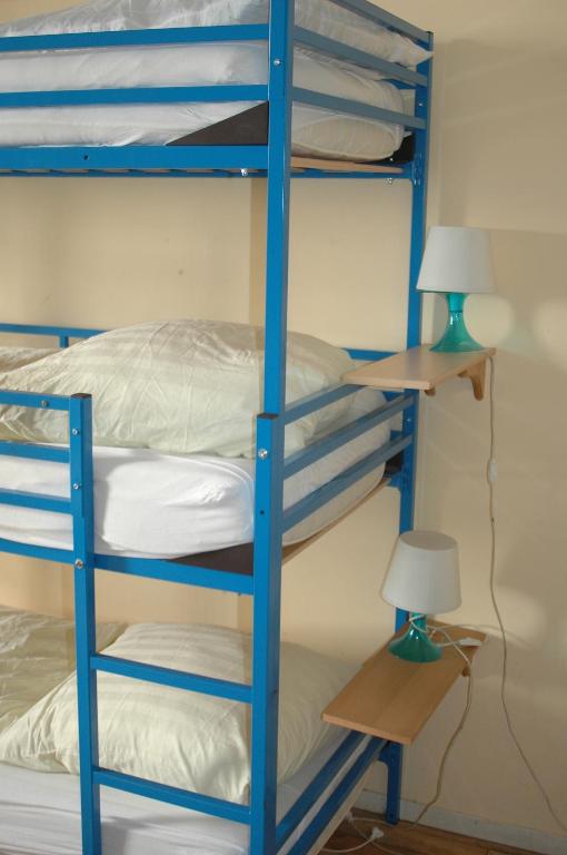 Postel nebo postele na pokoji v ubytování Buch-Ein-Bett Hostel