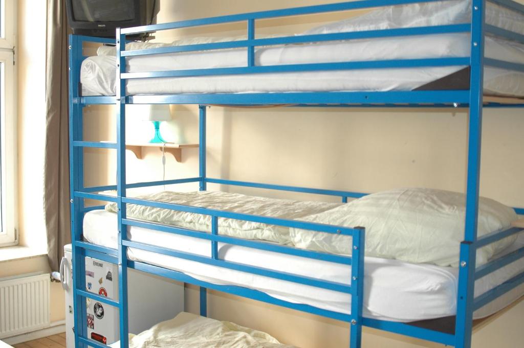 Postel nebo postele na pokoji v ubytování Buch-Ein-Bett Hostel