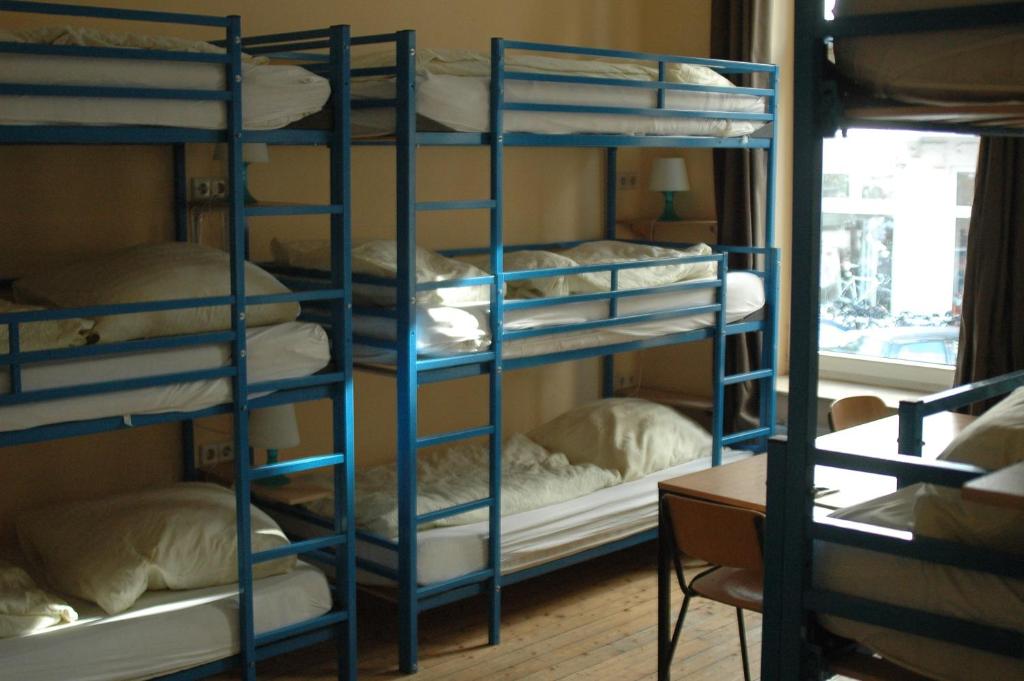 Postel nebo postele na pokoji v ubytování Buch-Ein-Bett Hostel