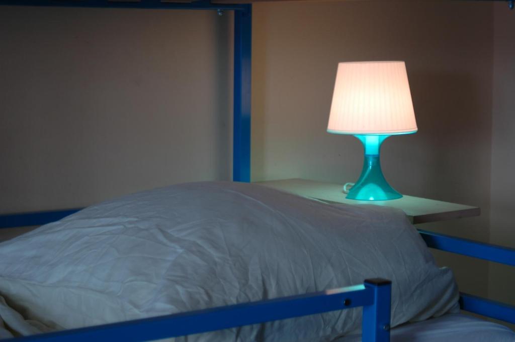 Postel nebo postele na pokoji v ubytování Buch-Ein-Bett Hostel