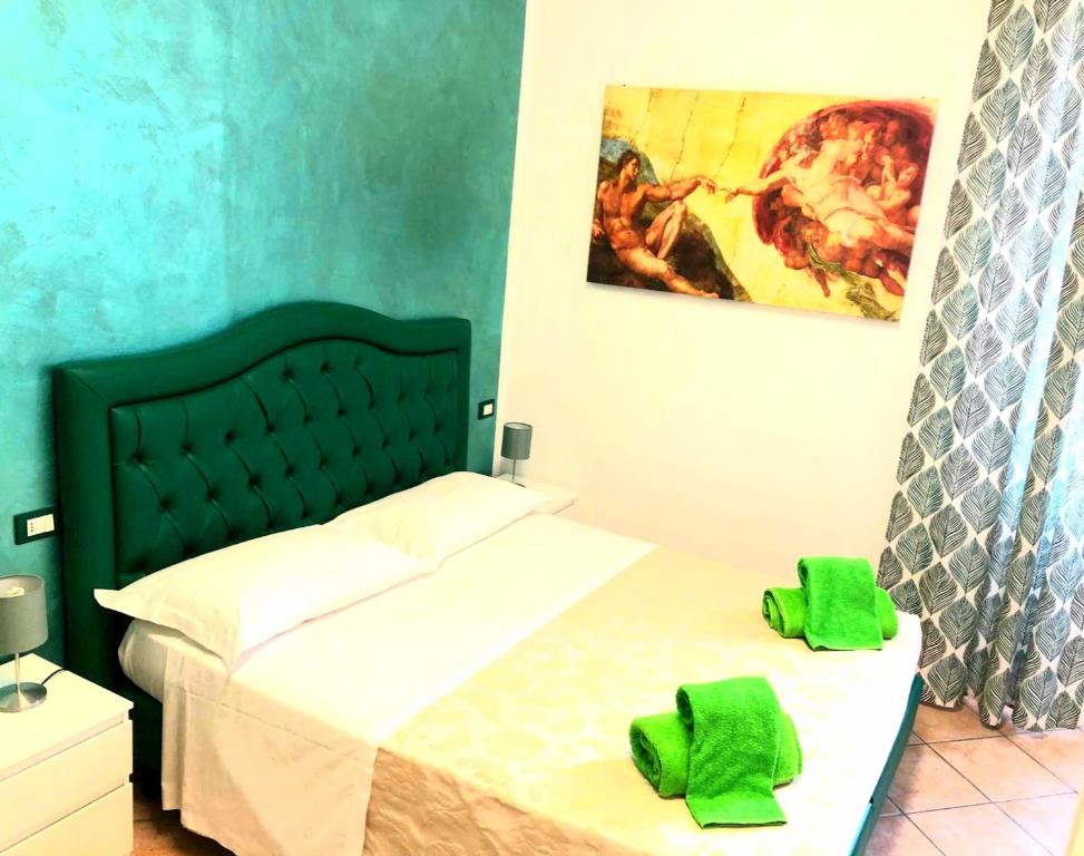 A bed or beds in a room at B&B La Cittadella