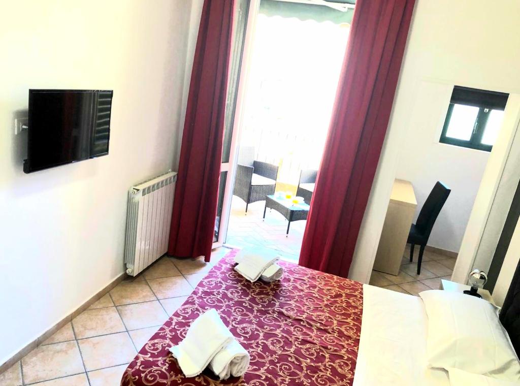 A bed or beds in a room at B&B La Cittadella