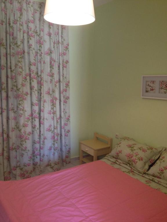A bed or beds in a room at erato1