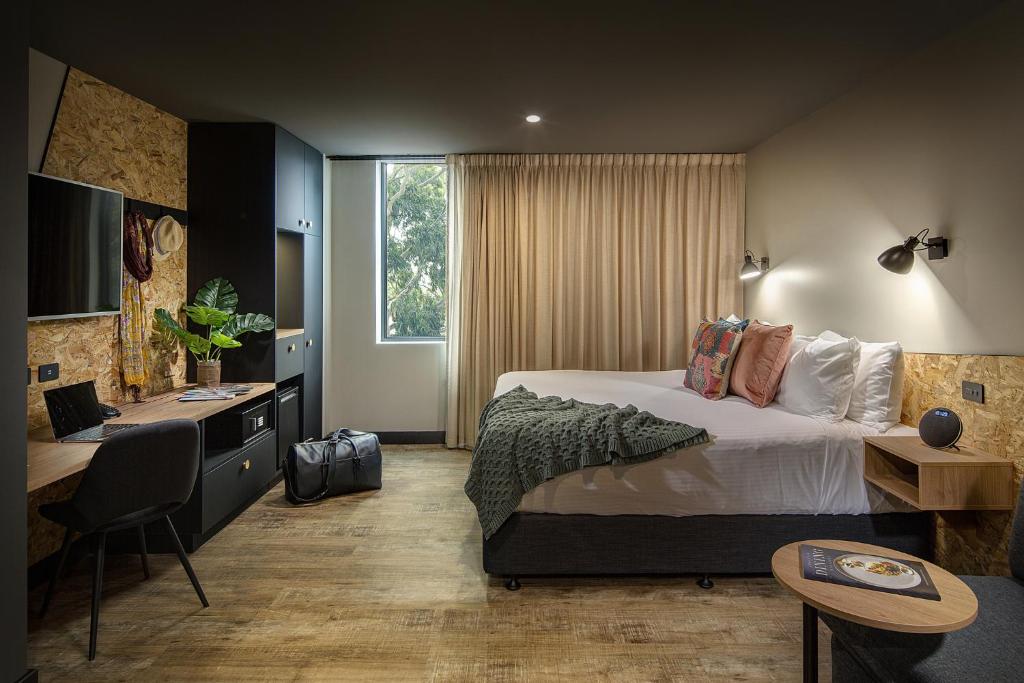 Postel nebo postele na pokoji v ubytování Marion Hotel