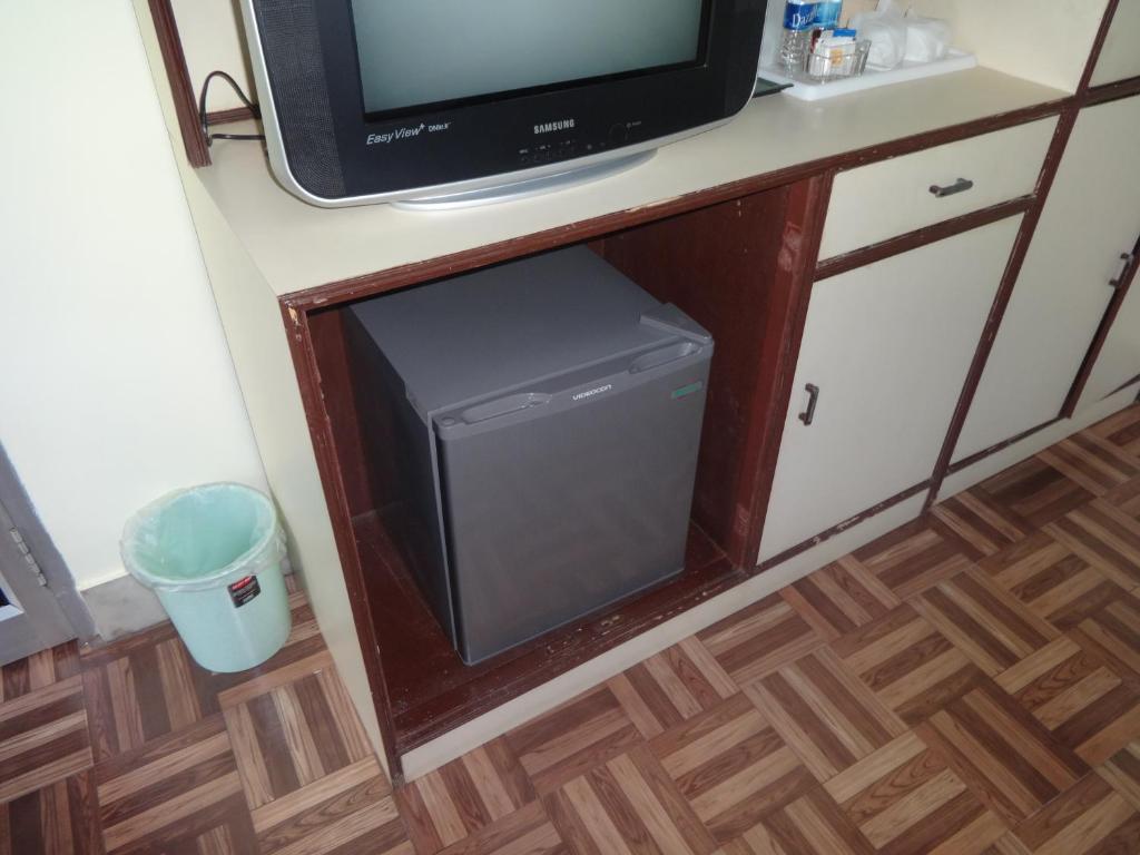 Kuchyň nebo kuchyňský kout v ubytování Hotel Gandhara