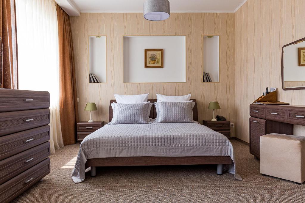 Postel nebo postele na pokoji v ubytování Sibirskiy Safari Club