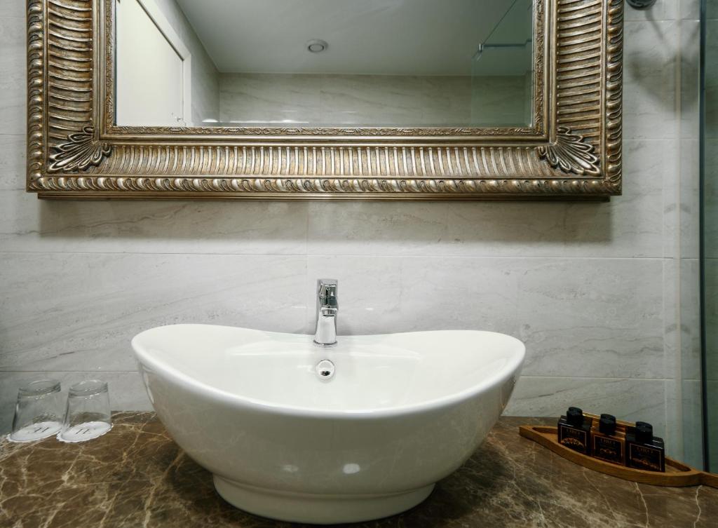 Koupelna v ubytování Boutique Hotel Portorose