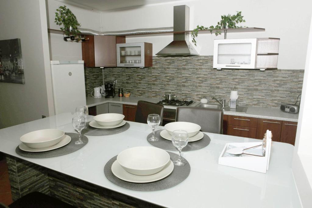 Kuchyň nebo kuchyňský kout v ubytování Apartament-Studio