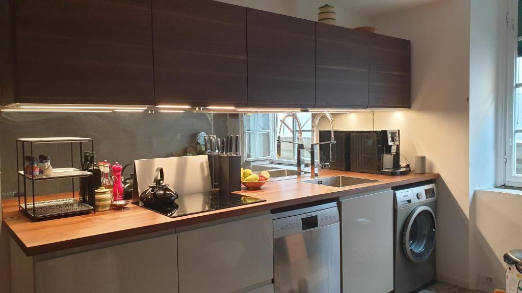 A kitchen or kitchenette at The SPIRIT OF LUCCA with all comfortable amenities
