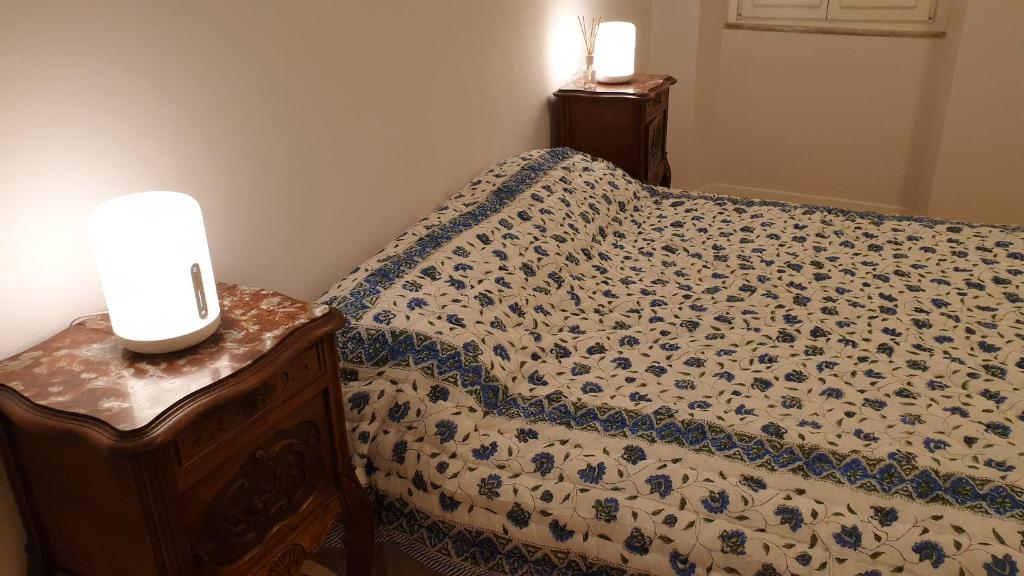 A bed or beds in a room at The SPIRIT OF LUCCA with all comfortable amenities